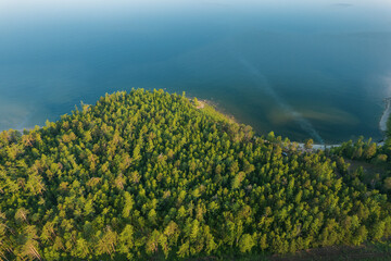 Summertime imagery of Lake Baikal is a rift lake located in southern Siberia, Russia. Baikal lake summer landscape view. Drone's Eye View.