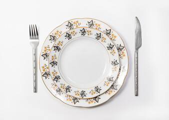 Luxury Vintage Porcelain tableware - Set of Plates with Utensils on white backgroun, top view