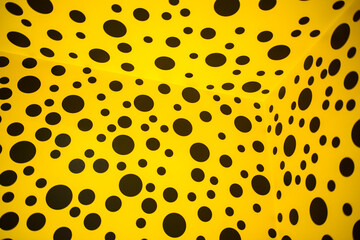 Black dots on yellow background texture