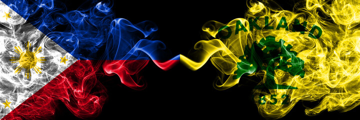 Philippines, Filipino vs United States of America, America, US, USA, American, Oakland, California smoke flags side by side.