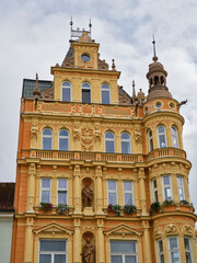 Fototapeta na wymiar Beautiful orange house in Ceske Budejovice, Czech Republic