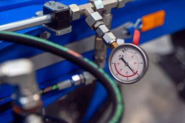 Close-up of industiral machine pressure indicator