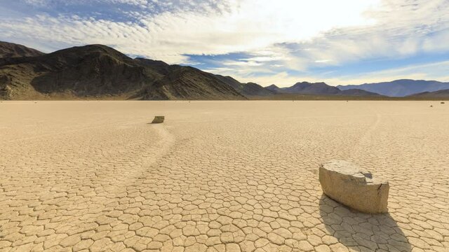 Time lapse of the clouds above the famous moving rocks on the Race Track dry lake in Death Valley