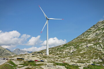 Wind turbine in the St. Gotthard Pass in the Swiss Alps. Airolo, Swiss - August 2021