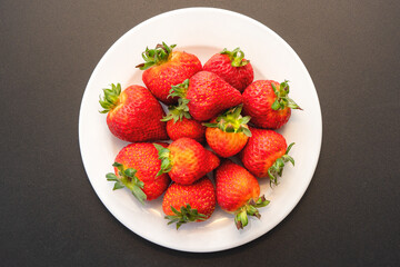 strawberries on a white plate
