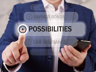  POSSIBILITIES text in list. Loan officer looking for something at smartphone.