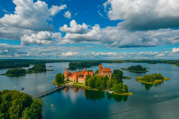 Fototapeta na wymiar Aerial view of Trakai Island Castle - a medieval gothic castle located in Lithuania, on an island in Lake Galve. The construction begun in the 14th century and around 1409 major works were completed