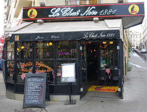 Small tavern and street cafe in Paris Le chat noir