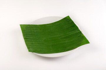 Banana Leaf on white plate isolated from white
