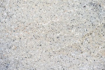 Closeup of rough textured rock as an abstract natural background
