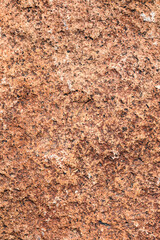 Closeup of rough textured rock as an abstract natural background
