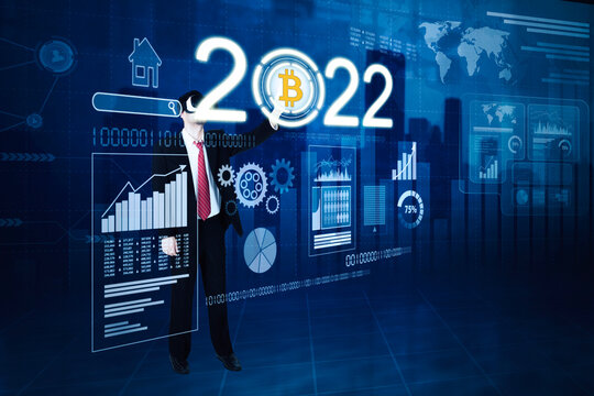 Businessman touch 2022 numbers with bitcoin button