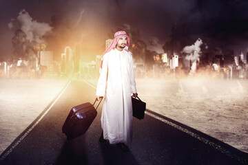 Middle Eastern man walk away from destroyed city