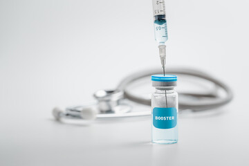 Syringe with liquid vaccines booster. fight against virus covid-19 coronavirus, Vaccination and...