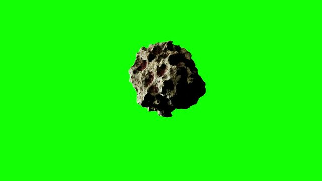 Brown-Grey Asteroid with notches and dents enters the view and is rushing towards the center of the screen on Greenscreen