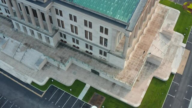 Tennessee State Capitol. Descending aerial of green roof and columns. Government.