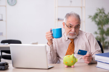 Fototapeta premium Old male employee in retirement concept