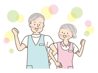 腕を組んで笑顔のシニア医療従事者