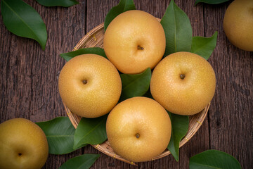 Snow pear or Shingo pear on a wooden background, Nashi pear fruits delicious and sweet on wooden...