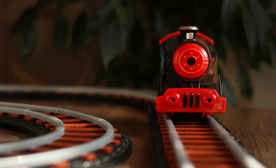 Children's railway with black train, children's toy