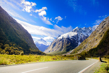 Naklejka premium Road to Milford sound Peak mountain New Zealand with blue sky.