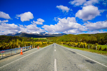 Road to Milford sound Peak mountain New Zealand with blue sky.