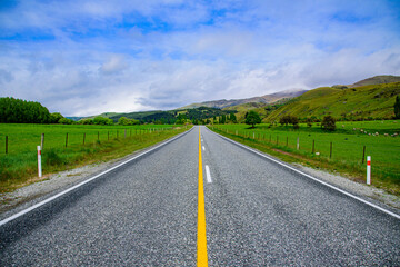 Fototapeta na wymiar Road to Mount Cook Peak mountain New Zealand with blue sky.
