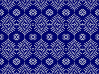 Geometric seamless ethnic traditional pattern in rectangle triangle floral style and crossing stripe line. Floral Rectangle in blue tone. Design for fabric background wallpaper vector carpet.