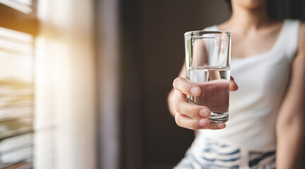 Beautiful girls drink water for good health, such as helping to digest food. Makes the heart work better, stimulates the digestive system, etc.