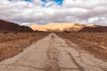 old asphalt road in the desert of the Negev
