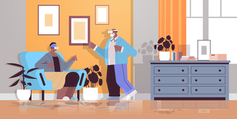 senior couple wearing vr headset grandparents in digital glasses exploring virtual reality interactive services active old age