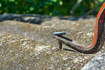 Pull nails out of the roof. Concept for tooth extraction, dentistry, home renovation