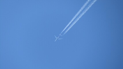 The plane is flying at high altitude over the Siberian taiga in the Russian Federation