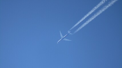 The plane is flying at high altitude over the Siberian taiga in the Russian Federation