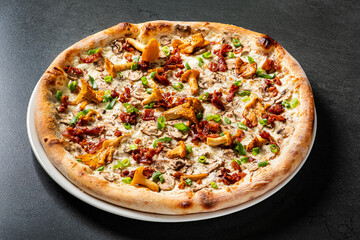 tasty pizza with chanterelles and vegetables