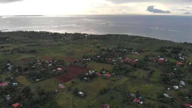 A small community living near the shore and beautiful beach of Daanbantayan Cebu. The shot is taken during sunset. The sea is calm and the place is peaceful. A popular tourist destination.
