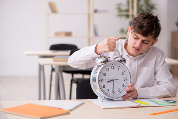 Male pupil in time management concept