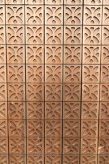 a wooden wall with a gingerbread pattern 