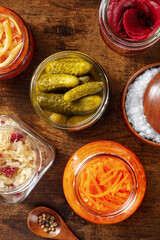 Probiotic foods. Fermented food. Canned sauerkraut, carrot, pickles and other preserves in glass...