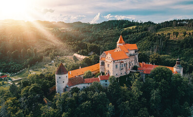 beautiful scenic aerial view of historical medieval Pernstejn castle in sunset, Czech Republic