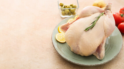 Plate with whole raw chicken, lemon and vegetables on color background, closeup