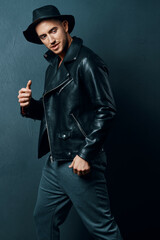 handsome man wearing hat leather jacket fashion modern posing style