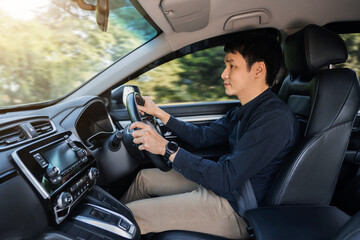 man driving a car