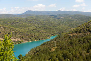 Naklejka premium landscape of a water body surrounded by mountains in a quiet place in spain