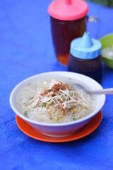 a bowl of chicken soup with rice