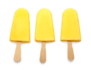 Tasty pineapple popsicles on white background