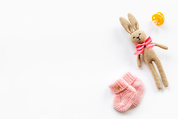 Baby accessories with rabbit toy and newborn booties shoes