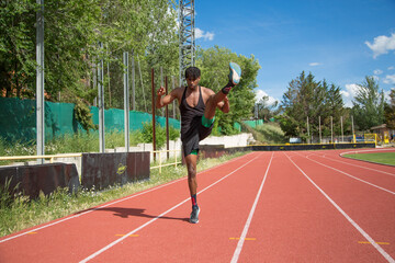 Fototapeta premium young african american man practicing running