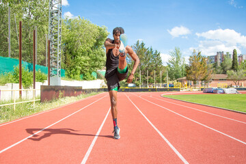 young african american man training on running track