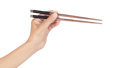 Hand holdig Bamboo chopsticks isolated on a white background.